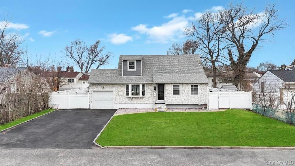 Photo of 41 Walton Street, Brentwood, NY 11717 (MLS # 977861)