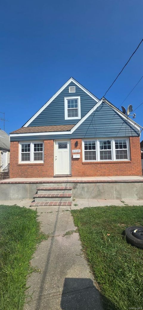 Photo of 10715 223rd Street, Queens Village, NY 11429 (MLS # 920569)