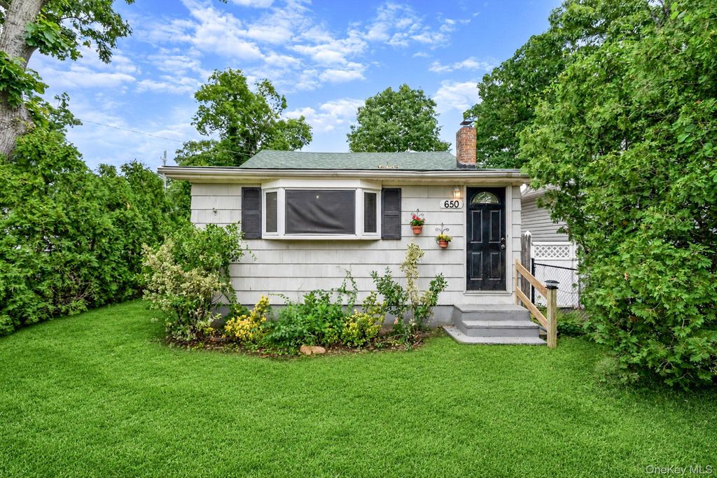 Photo of 650 College Road, Farmingville, NY 11738 (MLS # 1018810)