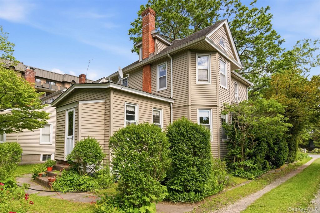 Photo of 149 Maple Avenue, Westbury, NY 11590 (MLS # 1009256)
