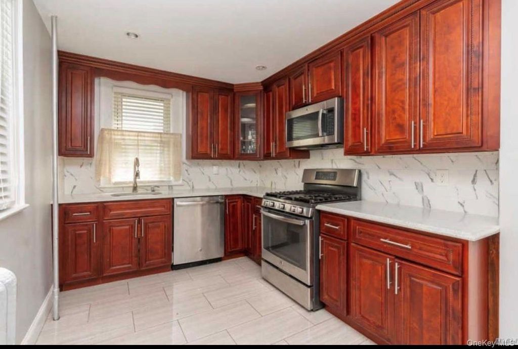 Photo of 19 Hamilton Pl, Hempstead, NY 11550 (MLS # 942764)