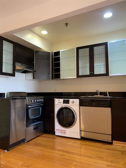 Photo of 8265 116th Street #604, Richmond Hill, NY 11418 (MLS # 971723)