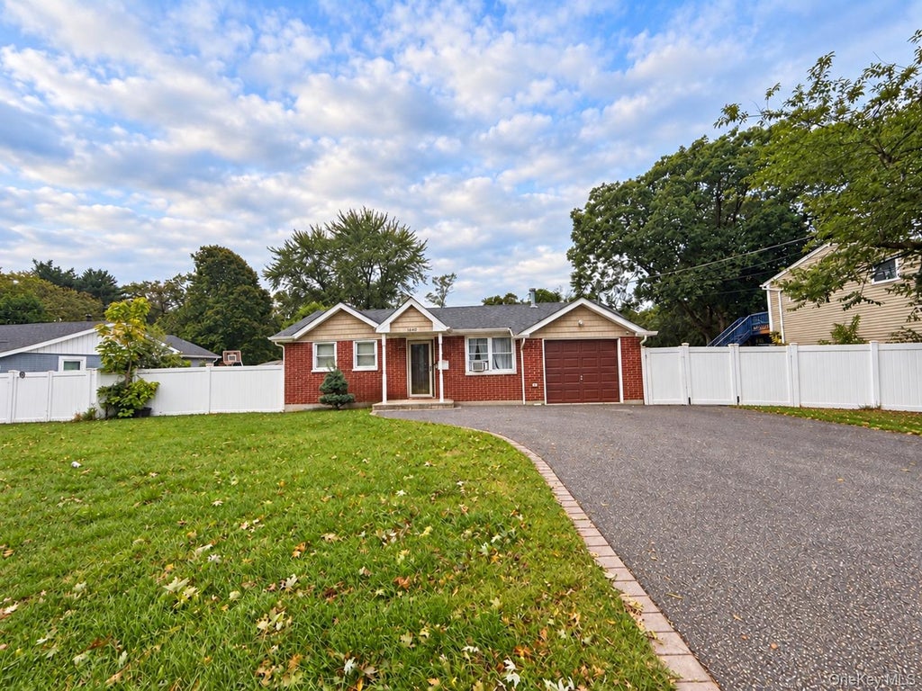 Photo of 1660 N Gardiner Drive, Bay Shore, NY 11706 (MLS # 1063729)