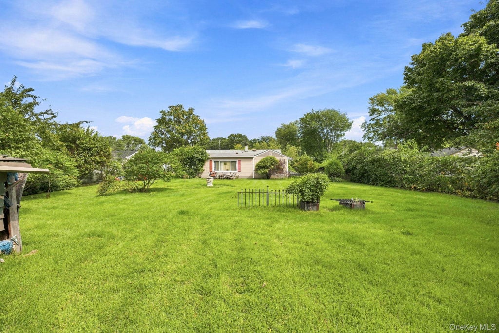 Photo of 1058 Bay Shore Avenue, Bay Shore, NY 11706 (MLS # 1064941)