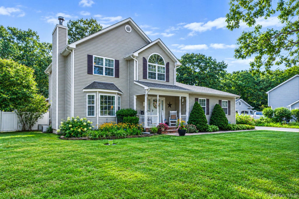 Photo of 8 Sommerset Drive, Yaphank, NY 11980 (MLS # 1048955)
