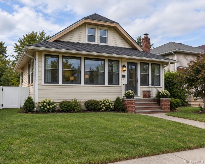 Photo of 58 W Windsor Parkway, Oceanside, NY 11572 (MLS # 1054915)