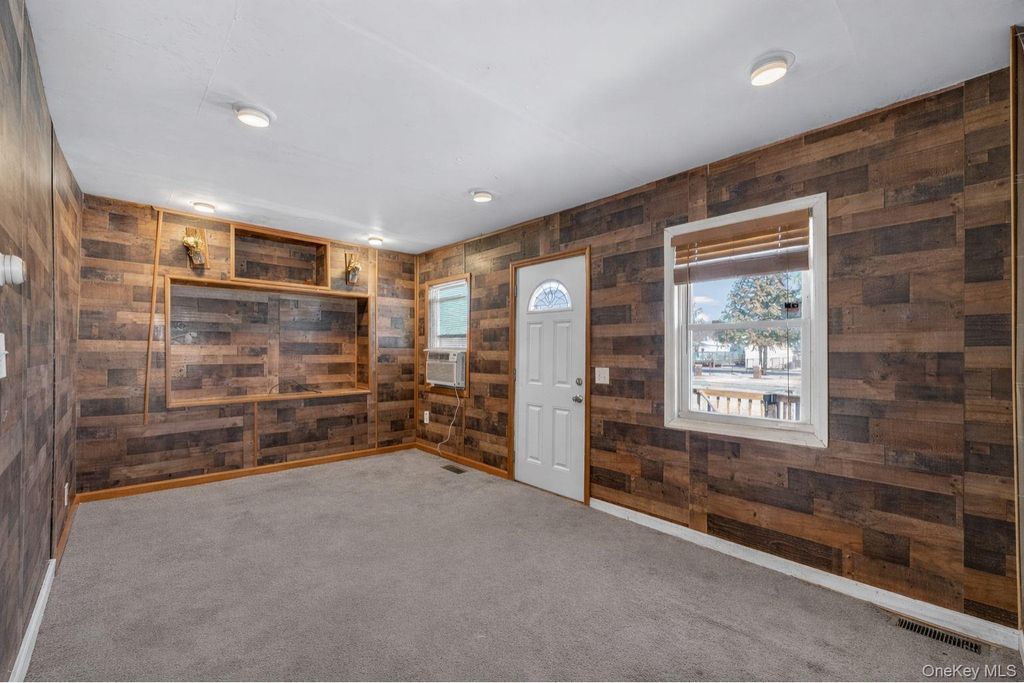 Photo of 12 Hackensack Road, Mastic Beach, NY 11951 (MLS # 963129)