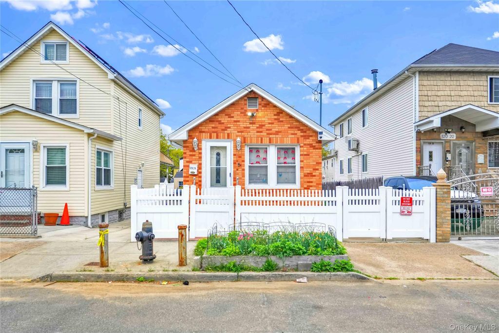 Photo of 12024 147th Street, Jamaica, NY 11436 (MLS # 992941)
