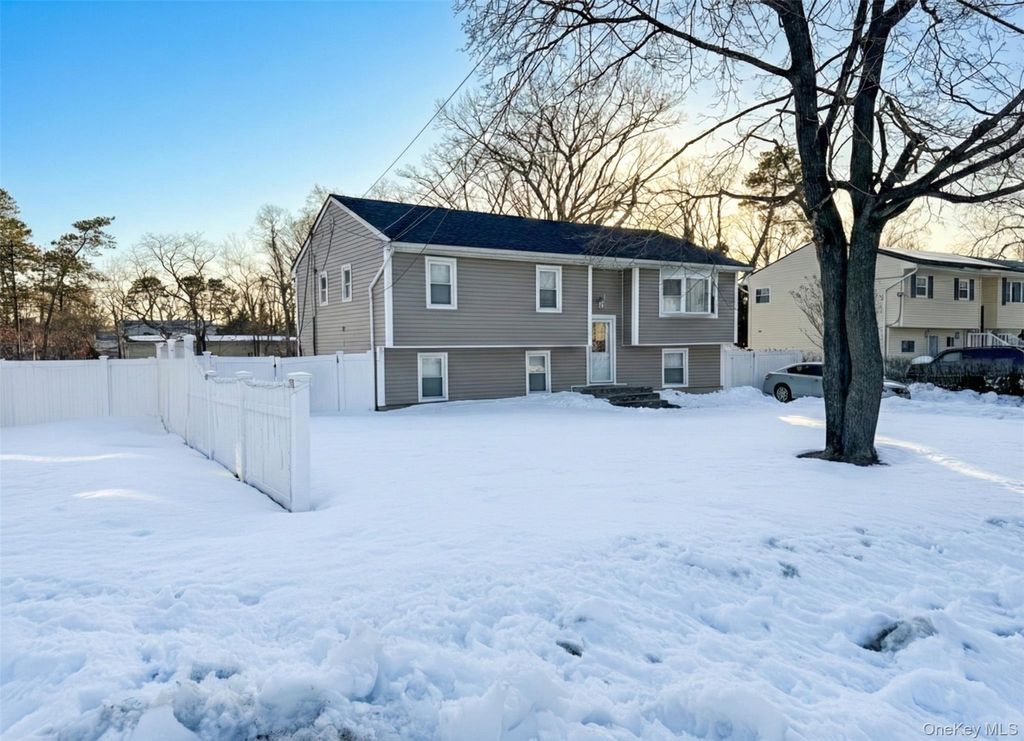 Photo of 76 Woodland Avenue, Central Islip, NY 11722 (MLS # 965825)