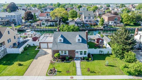 Homes For Sale - 48 W 3rd Street<br/> Freeport, NY 11520