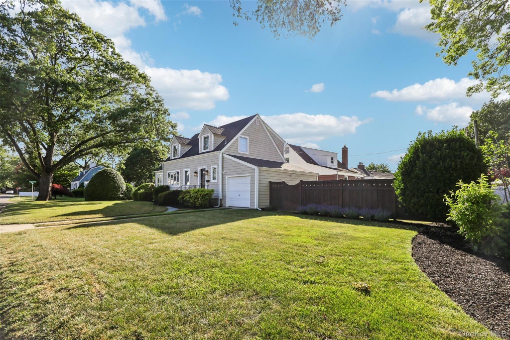 Photo of 1660 Fenimore Road, Hewlett, NY 11557 (MLS # 1012633)