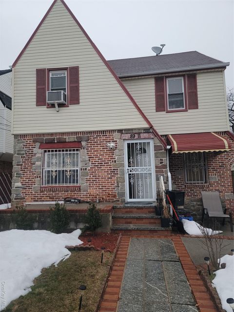 Photo of 89-11 207th Street, Queens Village, NY 11427 (MLS # 968105)