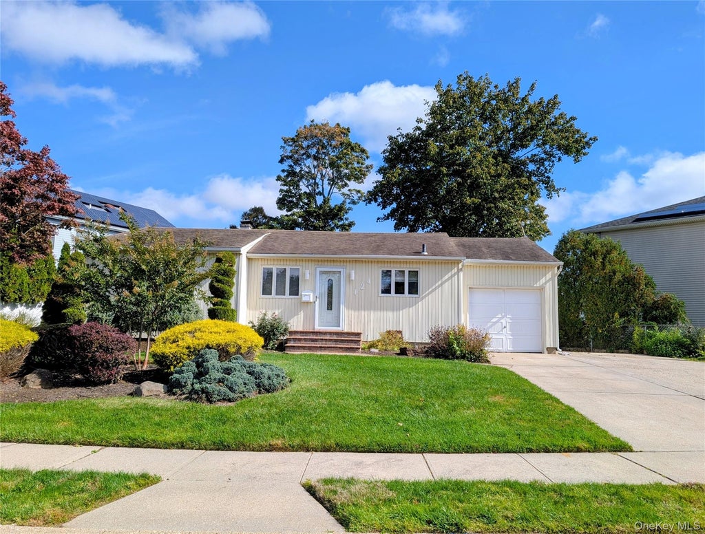 Photo of 124 Morton Boulevard, Plainview, NY 11803 (MLS # 1062276)