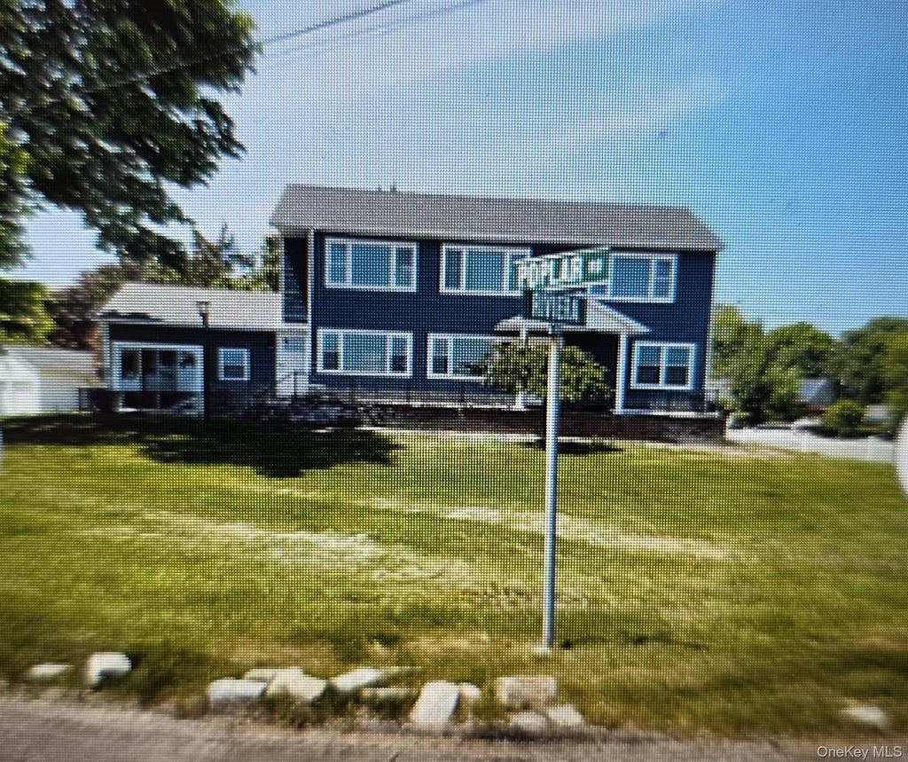 Photo of 476 Riviera Drive, Mastic Beach, NY 11951 (MLS # 1048539)
