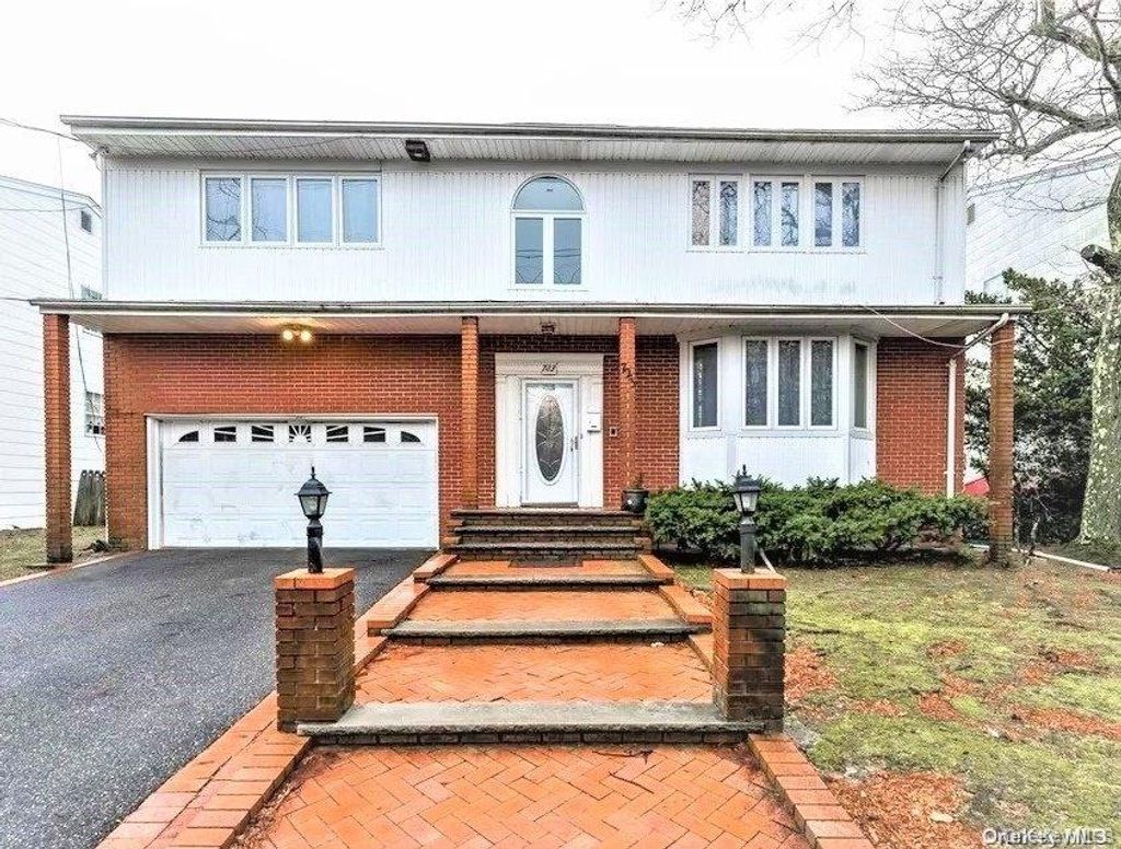 Photo of 723 Hungry Harbor Road, North Woodmere, NY 11581 (MLS # 951964)