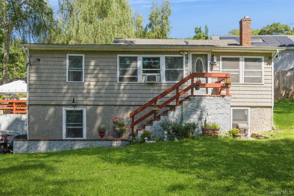 Photo of 25 Tamarack Road, Rocky Point, NY 11778 (MLS # 1048793)
