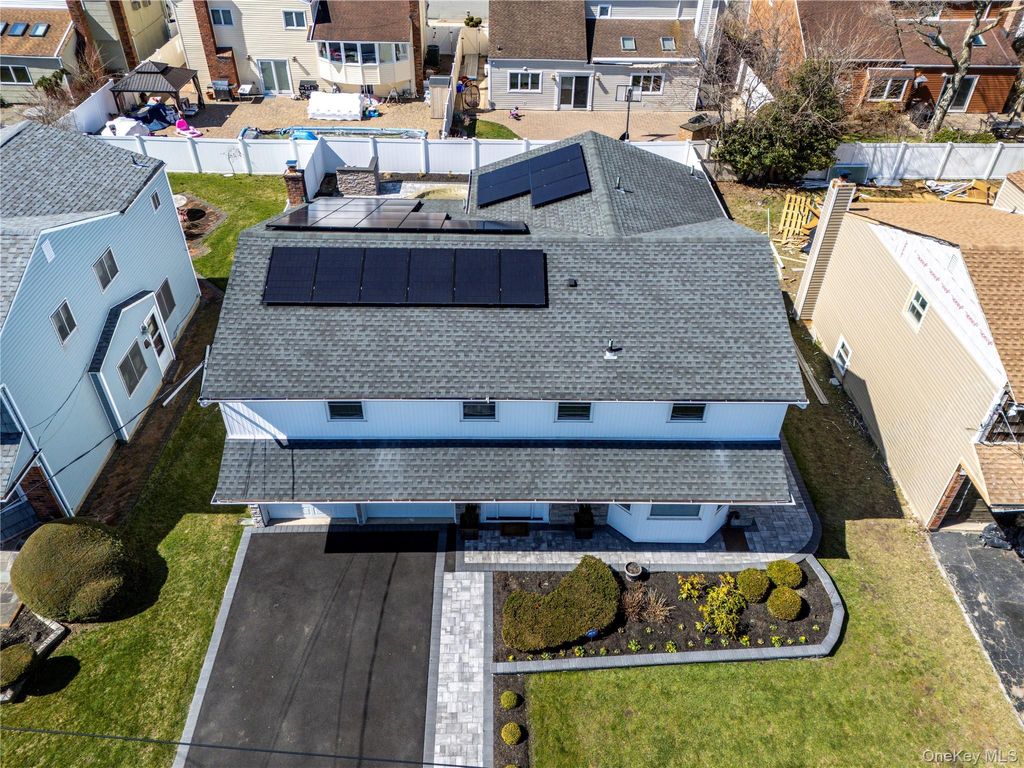 Photo of 3930 Jane Lane, Oceanside, NY 11572 (MLS # 974973)