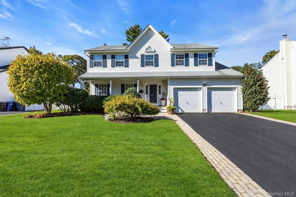 Photo of 82 Division Avenue, East Islip, NY 11730 (MLS # 1064967)
