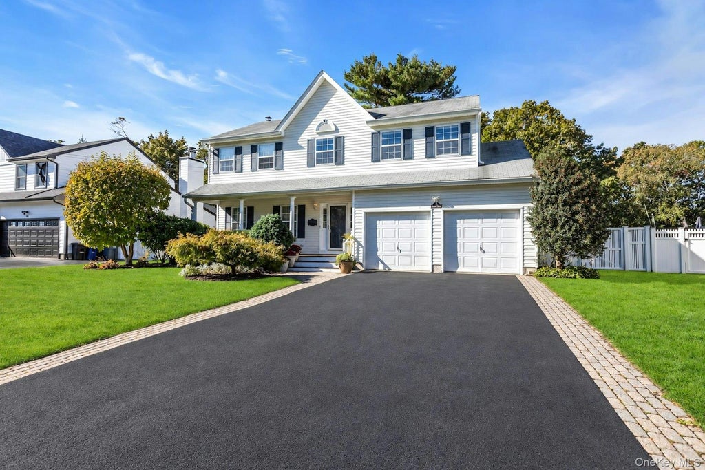 Photo of 82 Division Avenue, East Islip, NY 11730 (MLS # 1064967)