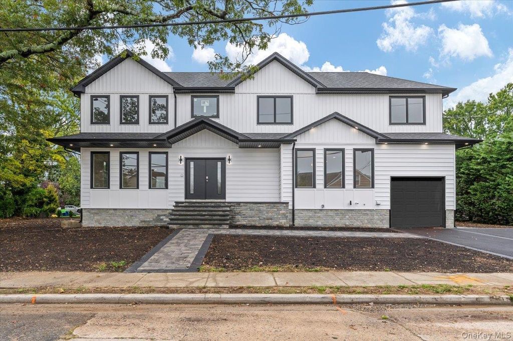 Photo of 1028 E Broadway, Woodmere, NY 11598 (MLS # 914736)