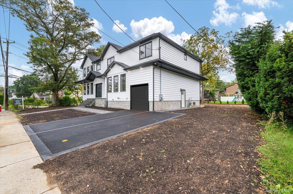 Photo of 1028 E Broadway, Woodmere, NY 11598 (MLS # 914736)