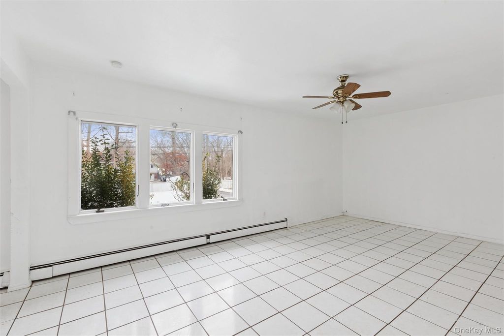 Photo of 103 W Yaphank Road, Coram, NY 11727 (MLS # 963590)