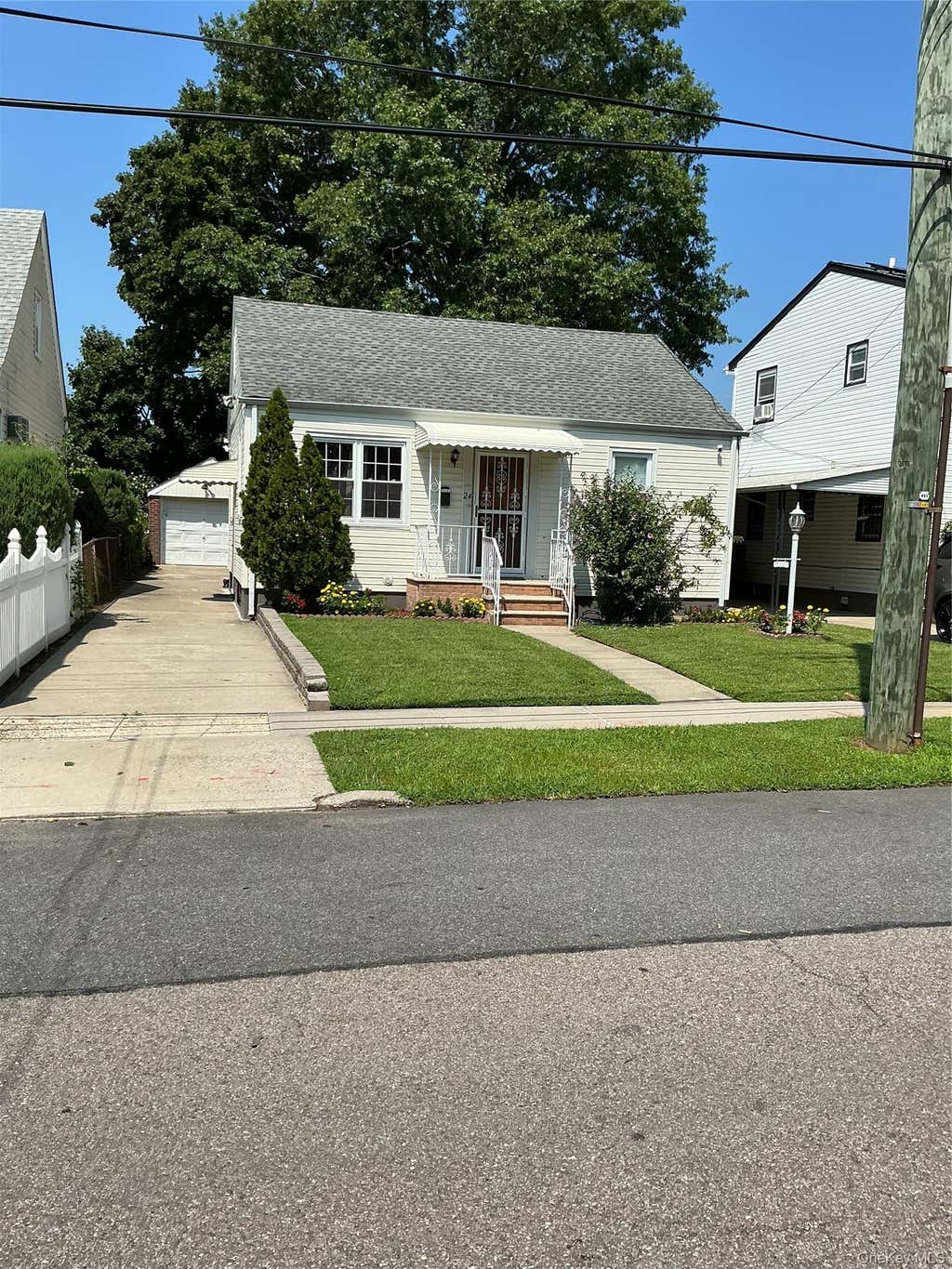 Photo of 11824 236th Street, Cambria Heights, NY 11411 (MLS # 1037272)