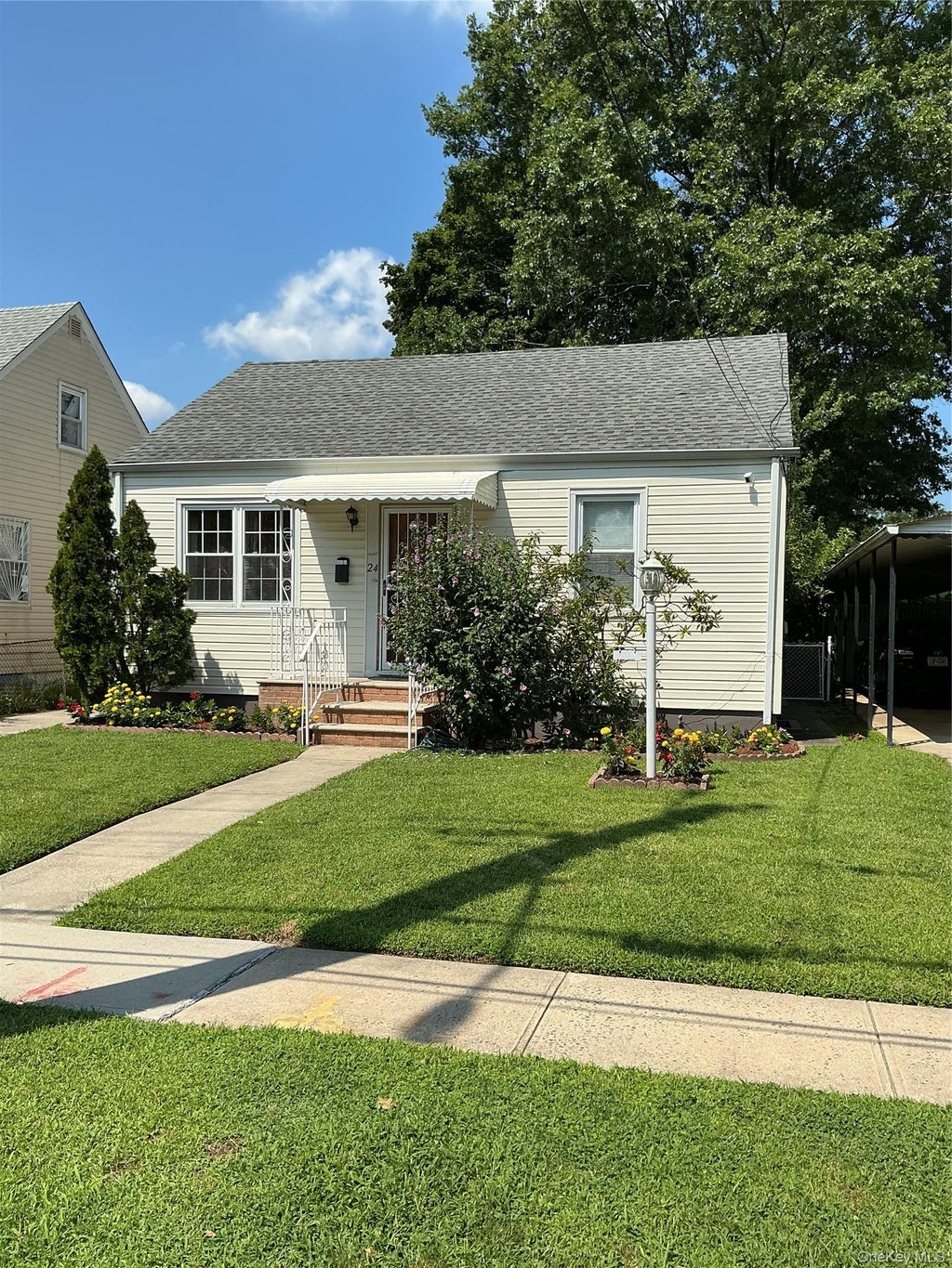 Photo of 11824 236th Street, Cambria Heights, NY 11411 (MLS # 1037272)