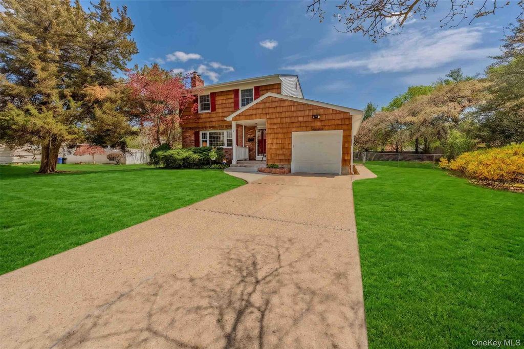 Photo of 14 Linford Lane, Melville, NY 11747 (MLS # 990261)