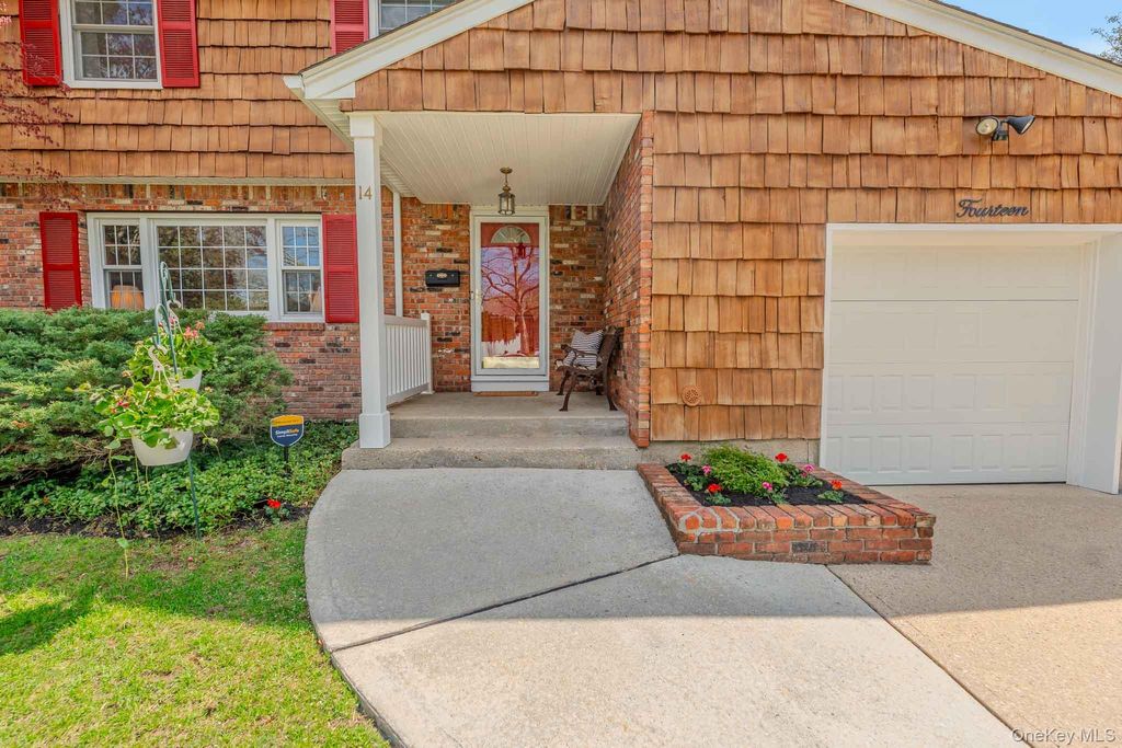 Photo of 14 Linford Lane, Melville, NY 11747 (MLS # 990261)