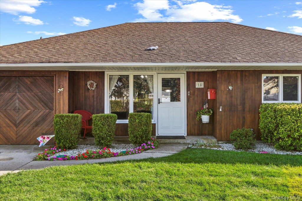 Photo of 18 Washington Street, Hicksville, NY 11801 (MLS # 1064079)