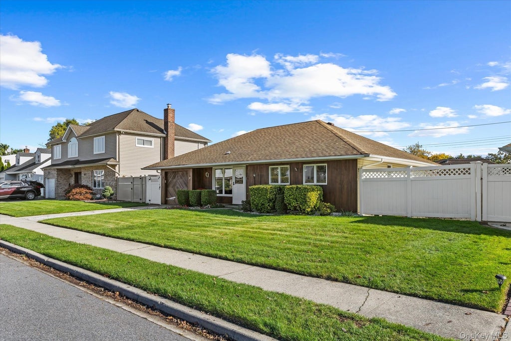 Photo of 18 Washington Street, Hicksville, NY 11801 (MLS # 1064079)