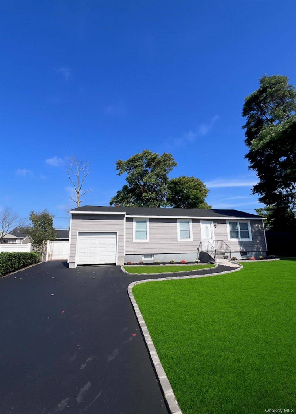 Photo of 41 S 22nd Street, Wyandanch, NY 11798 (MLS # 943020)