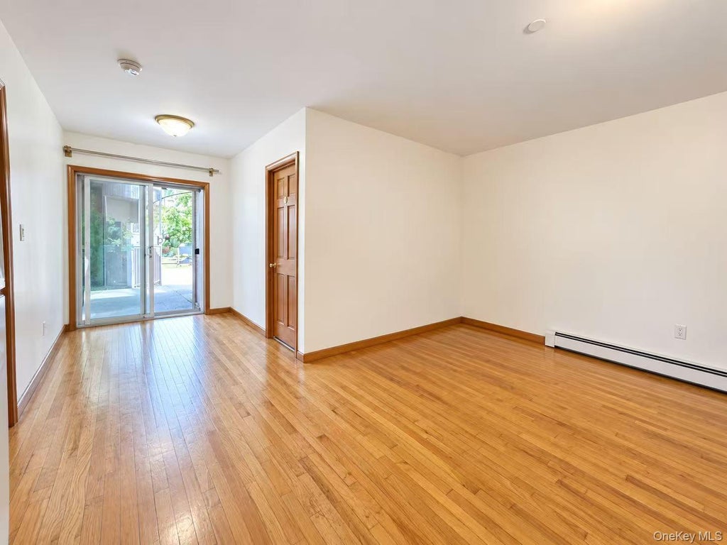 Photo of 104-61 38th Avenue, Corona, NY 11368 (MLS # 1055658)
