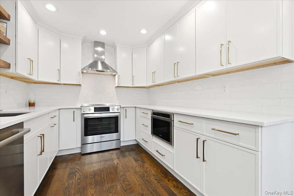 Photo of 49 Villas Circle, Melville, NY 11747 (MLS # 1043602)