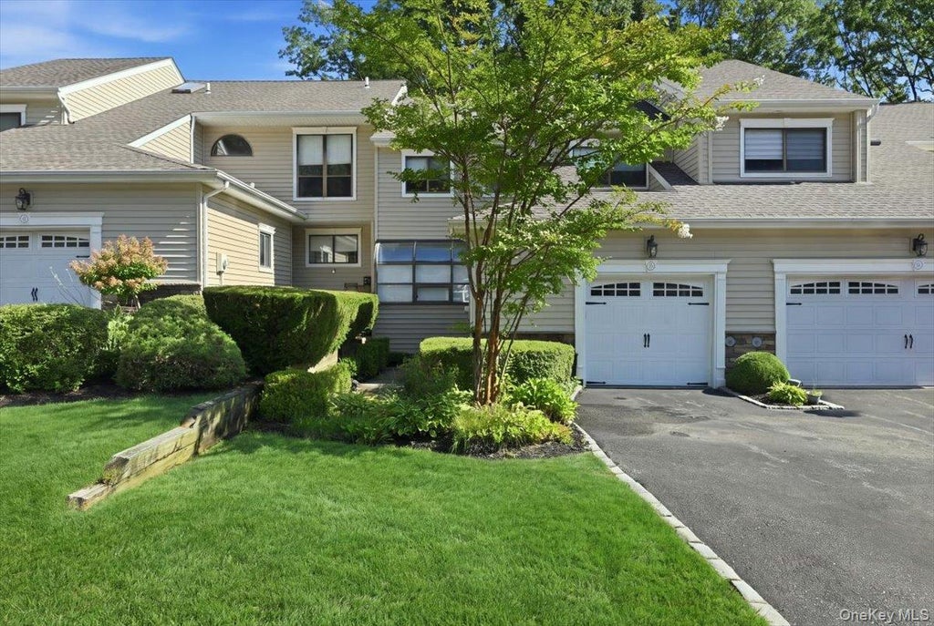 Photo of 49 Villas Circle, Melville, NY 11747 (MLS # 1043602)