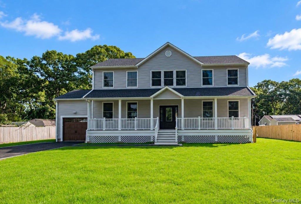 Photo of 71 Stuyvesant Avenue, Mastic, NY 11950 (MLS # 1052859)