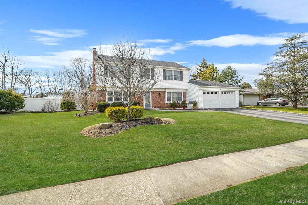 Photo of 30 Tulip Grove Drive, Lake Grove, NY 11755 (MLS # 980403)