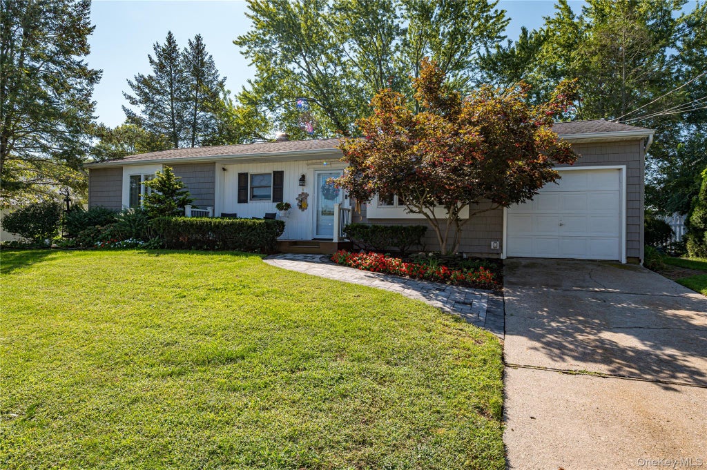 Photo of 10 Stonehurst Circle S, Centereach, NY 11720 (MLS # 1048451)