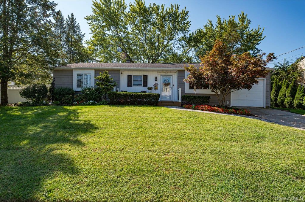Photo of 10 Stonehurst Circle S, Centereach, NY 11720 (MLS # 1048451)
