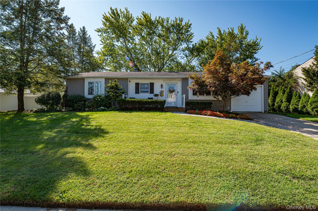 Photo of 10 Stonehurst Circle S, Centereach, NY 11720 (MLS # 1048451)