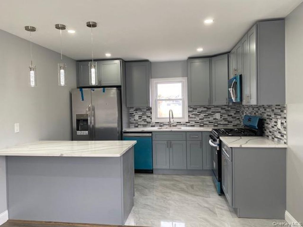 Photo of 8 Grant Avenue, Brentwood, NY 11717 (MLS # 971464)