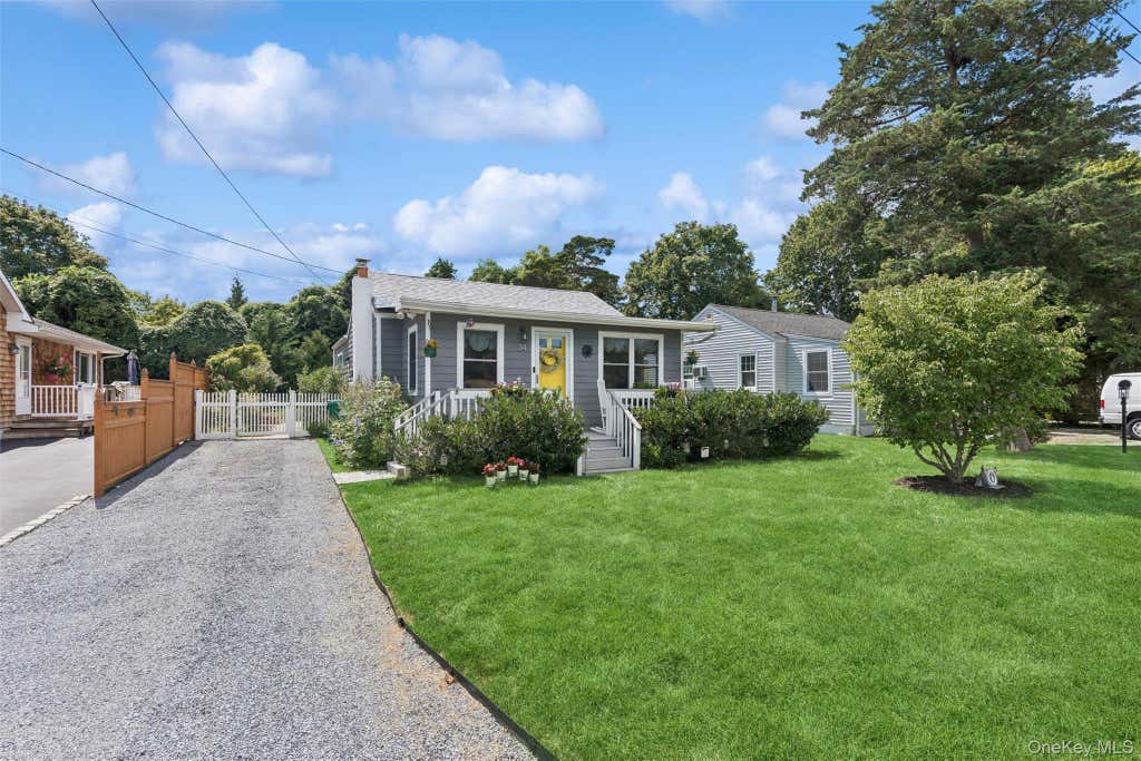 Photo of 34 W End Avenue, East Quogue, NY 11942 (MLS # 1042264)