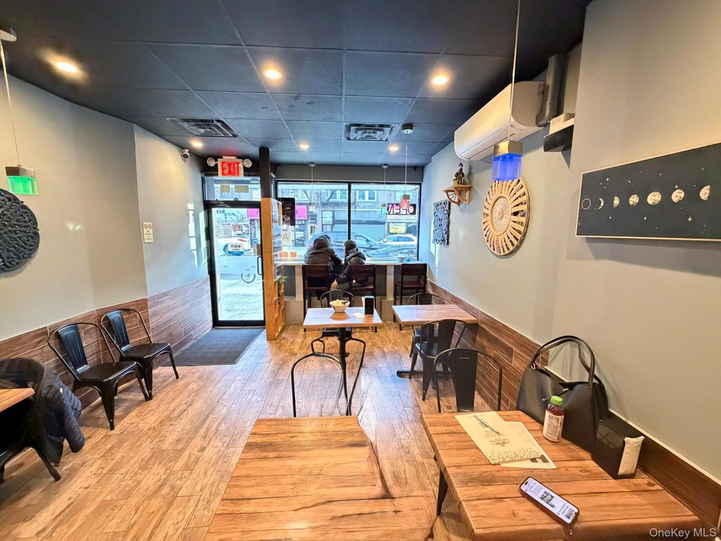 Photo of 199-05 32nd Avenue, Flushing, NY 11358 (MLS # 942757)