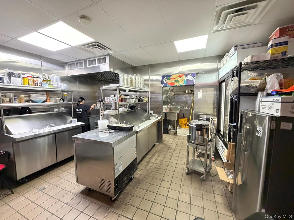 Photo of 199-05 32nd Avenue, Flushing, NY 11358 (MLS # 942757)