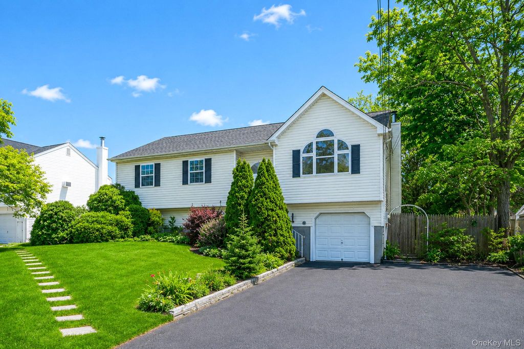 Photo of 57 Woodycrest Drive, Farmingville, NY 11738 (MLS # 1004026)