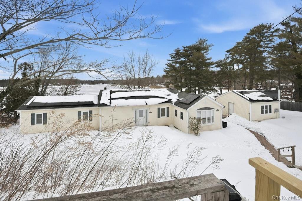 Photo of 63 Lakeside Trail, Ridge, NY 11961 (MLS # 960793)