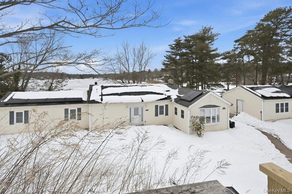 Photo of 63 Lakeside Trail, Ridge, NY 11961 (MLS # 960793)