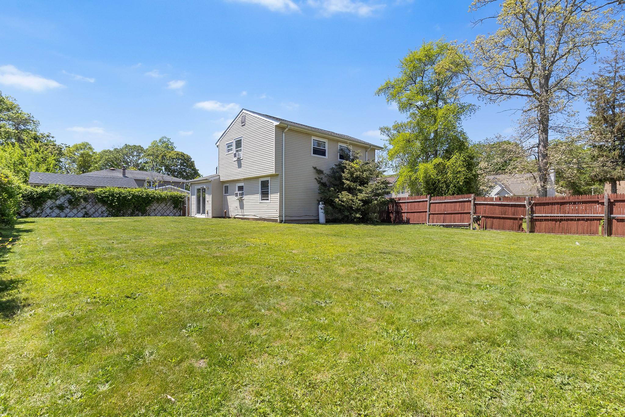 22 Harrison Drive, Shirley, New York image 19