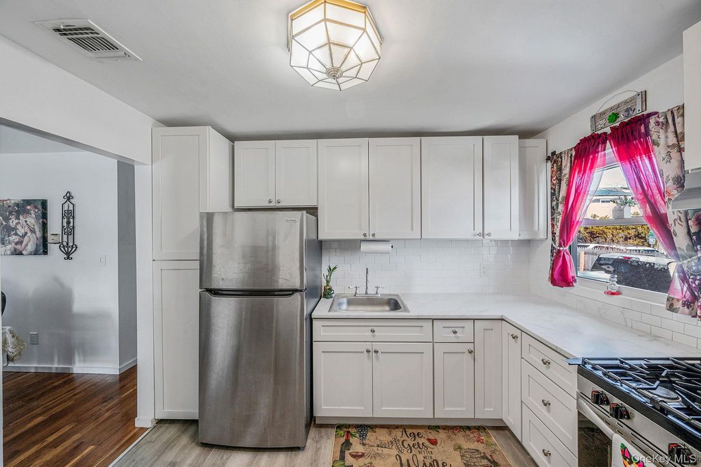 Photo of 221 Amsterdam Avenue, West Babylon, NY 11704 (MLS # 961365)